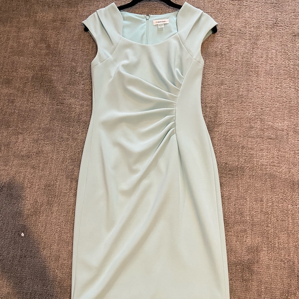 Calvin Klein size 2 ruched dress.  Aqua colored.  Worn once.